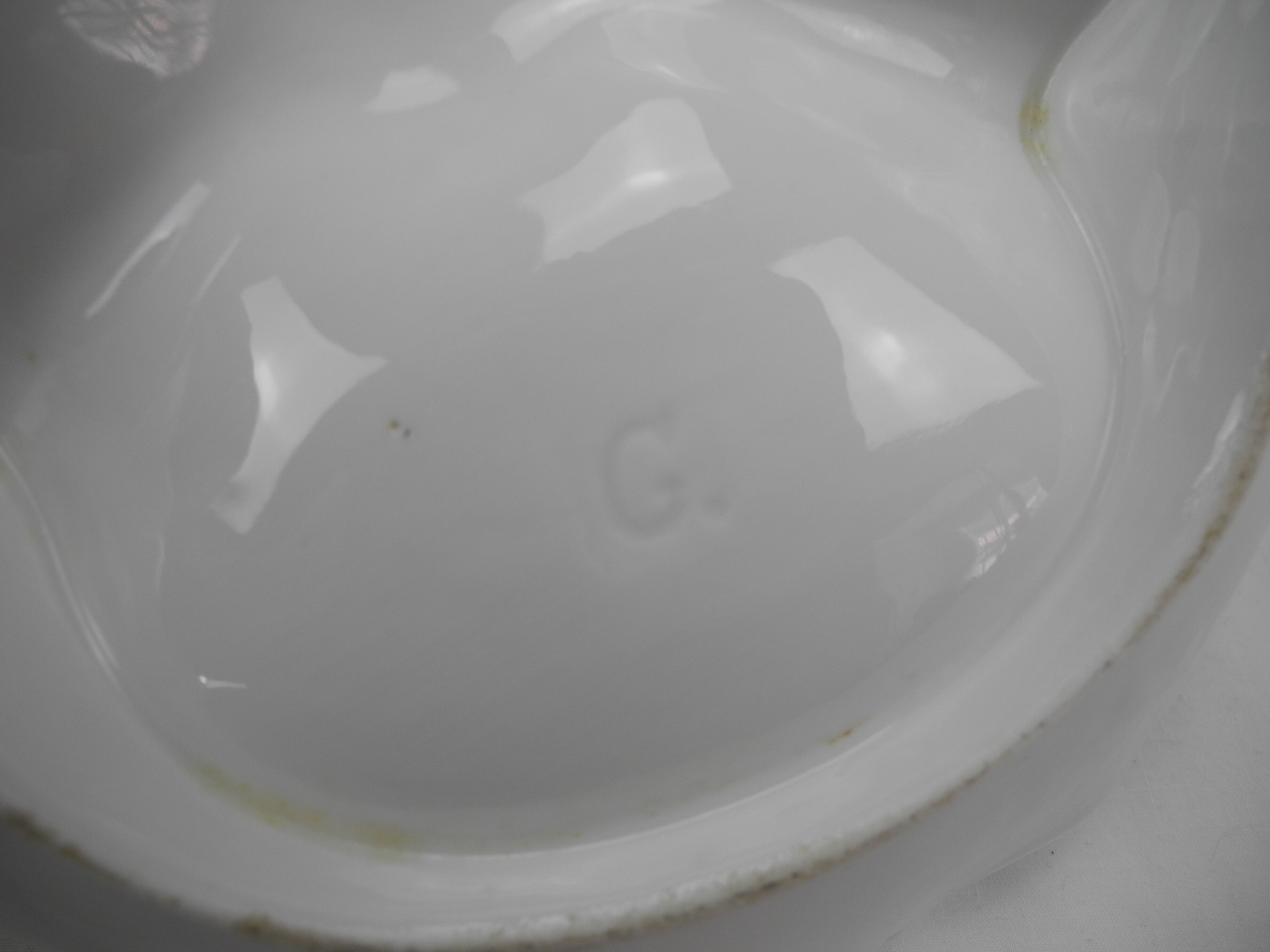 Old porcelain beggar serving dish