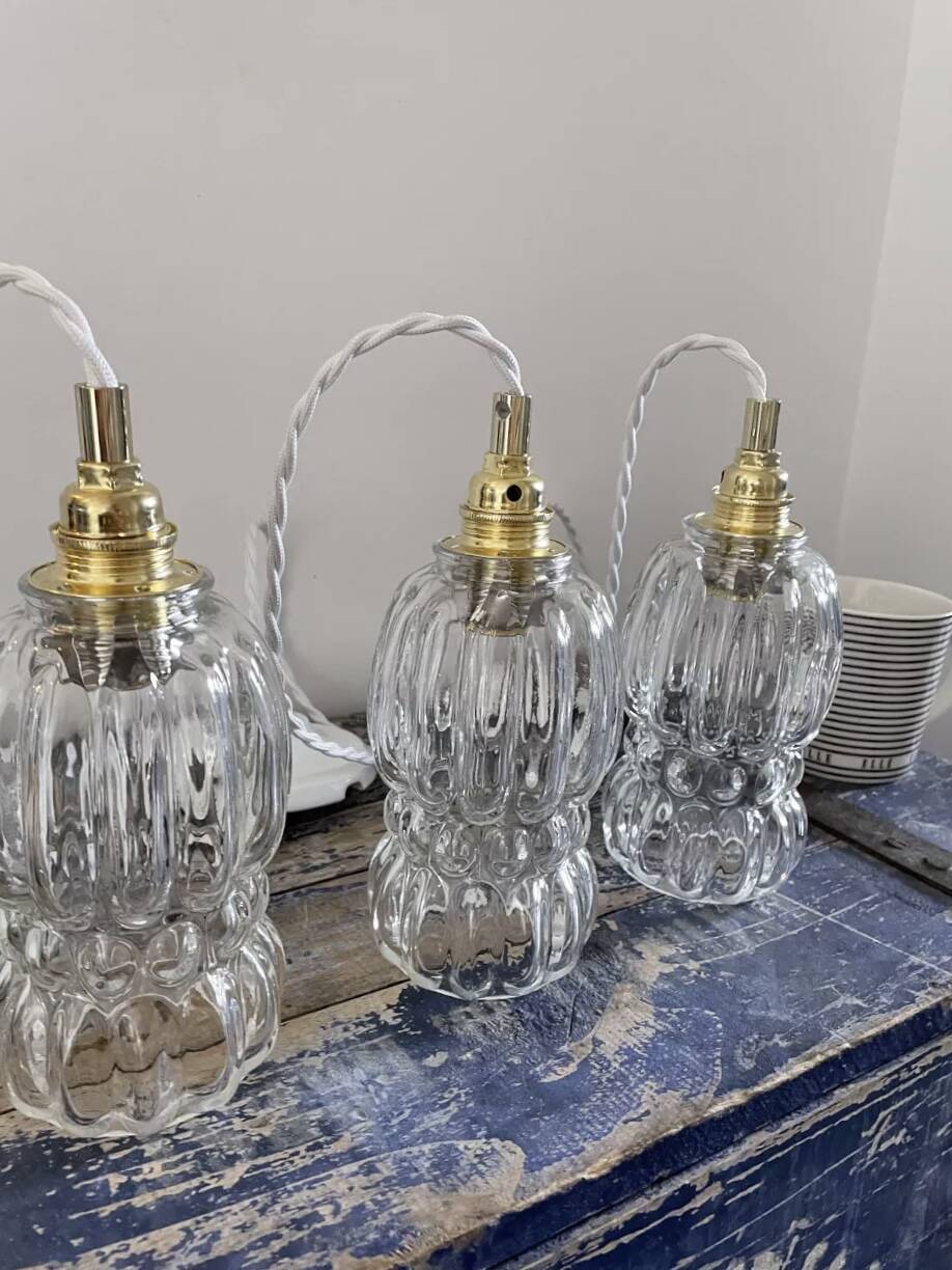 Set of three glass pendant lights of Scandinavian origin