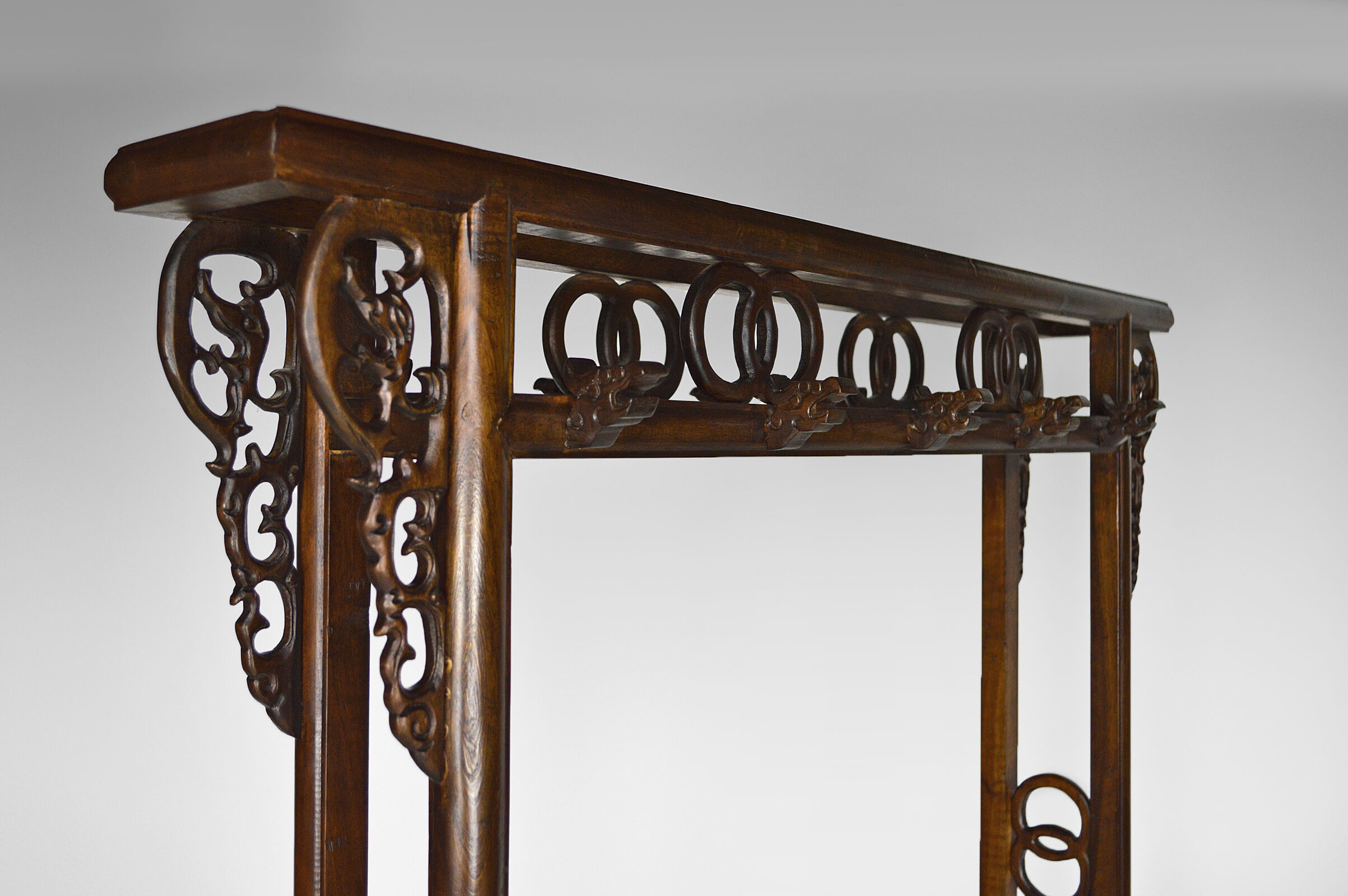 Wardrobe with Asian coat made of wood carved with dragons