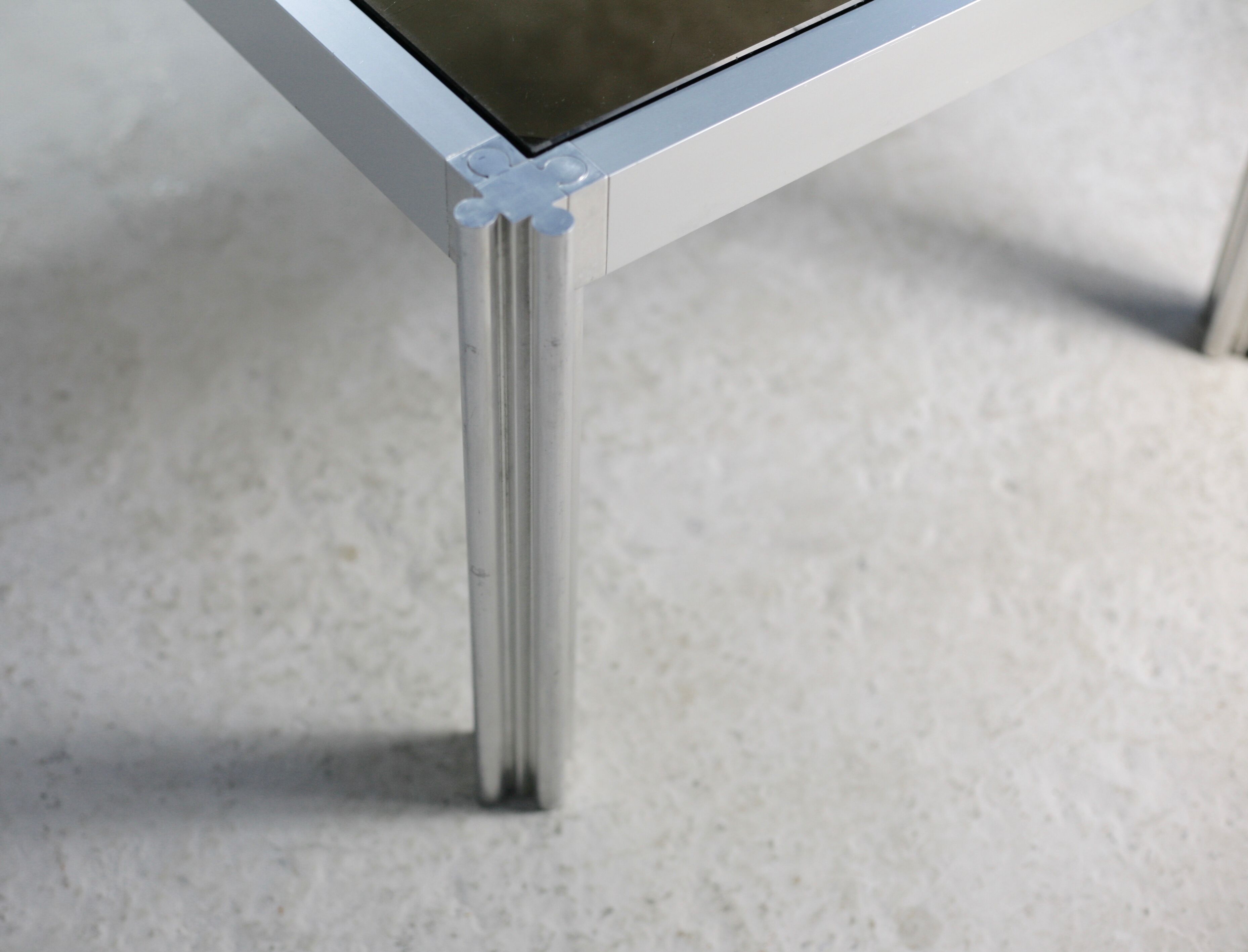 International Furniture. Steel coffee table and smoked glass. Circa 1970