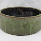 Bowl or empty pocket in cracked green sandstone varnish raku