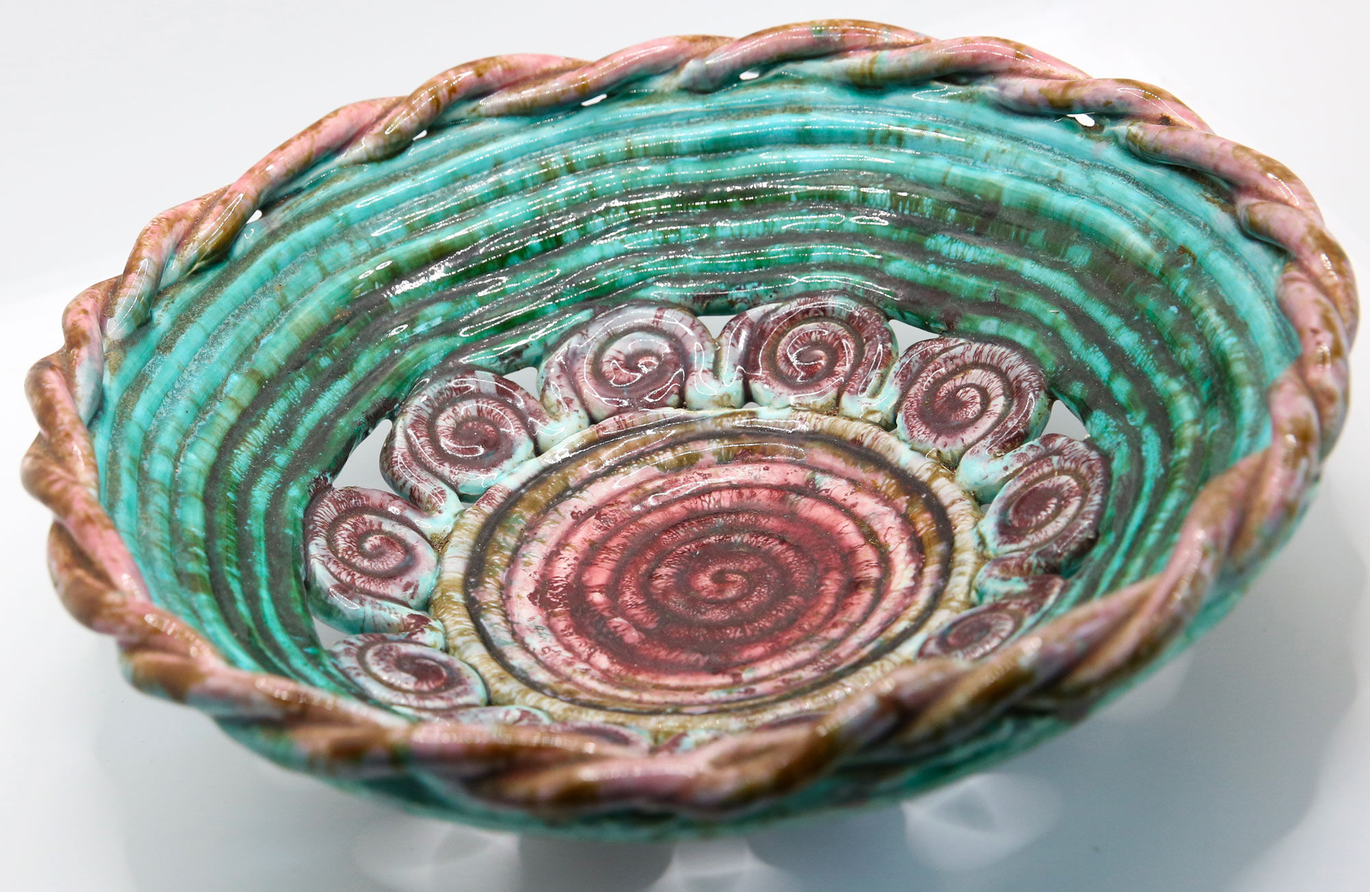 Vintage XL dish in openwork slurry with blue-green and old pink spirals