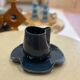 Set of ceramic artisan mugs with a pop of petrol blue water lily design.