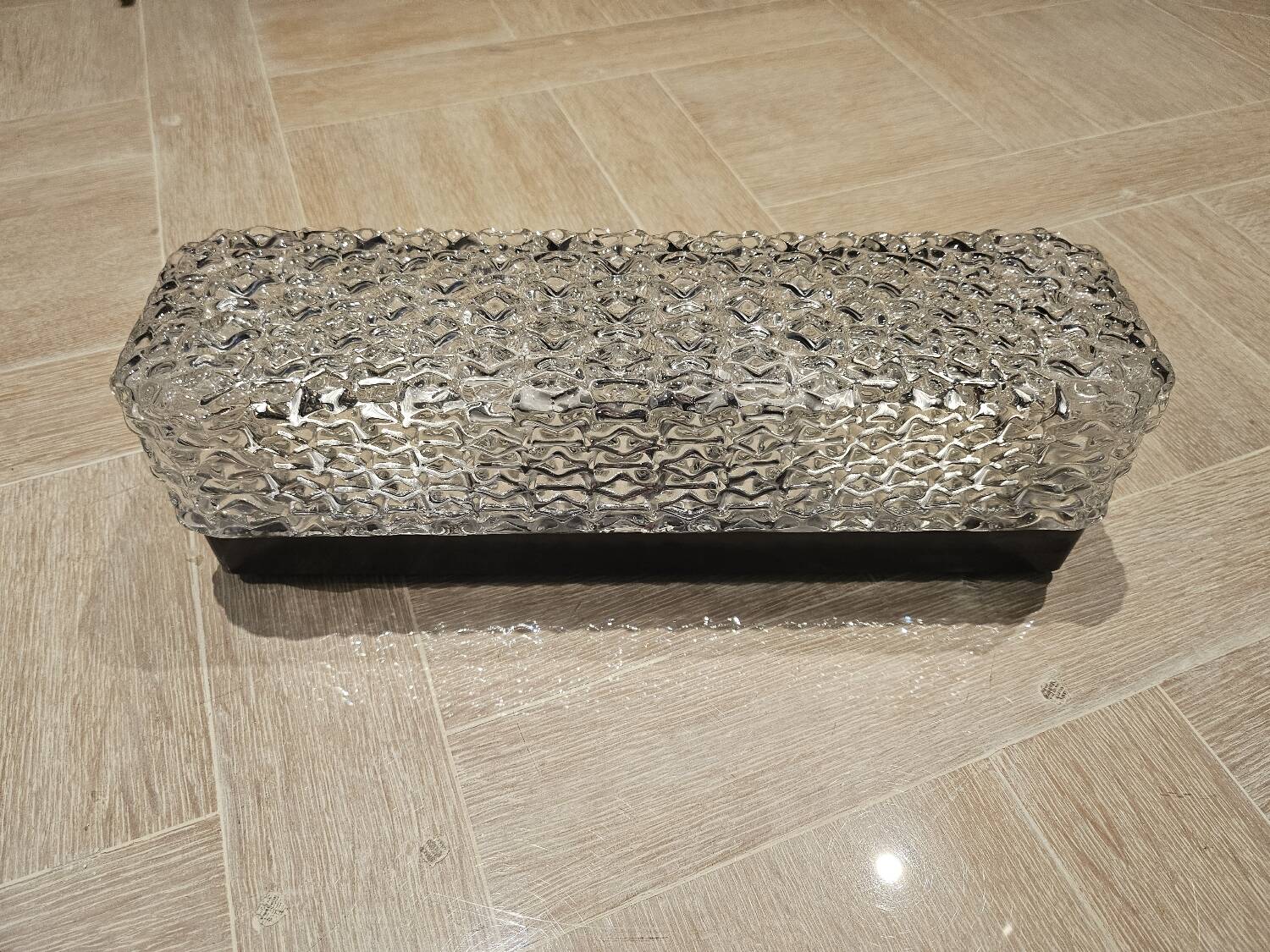 Hammered glass wall light