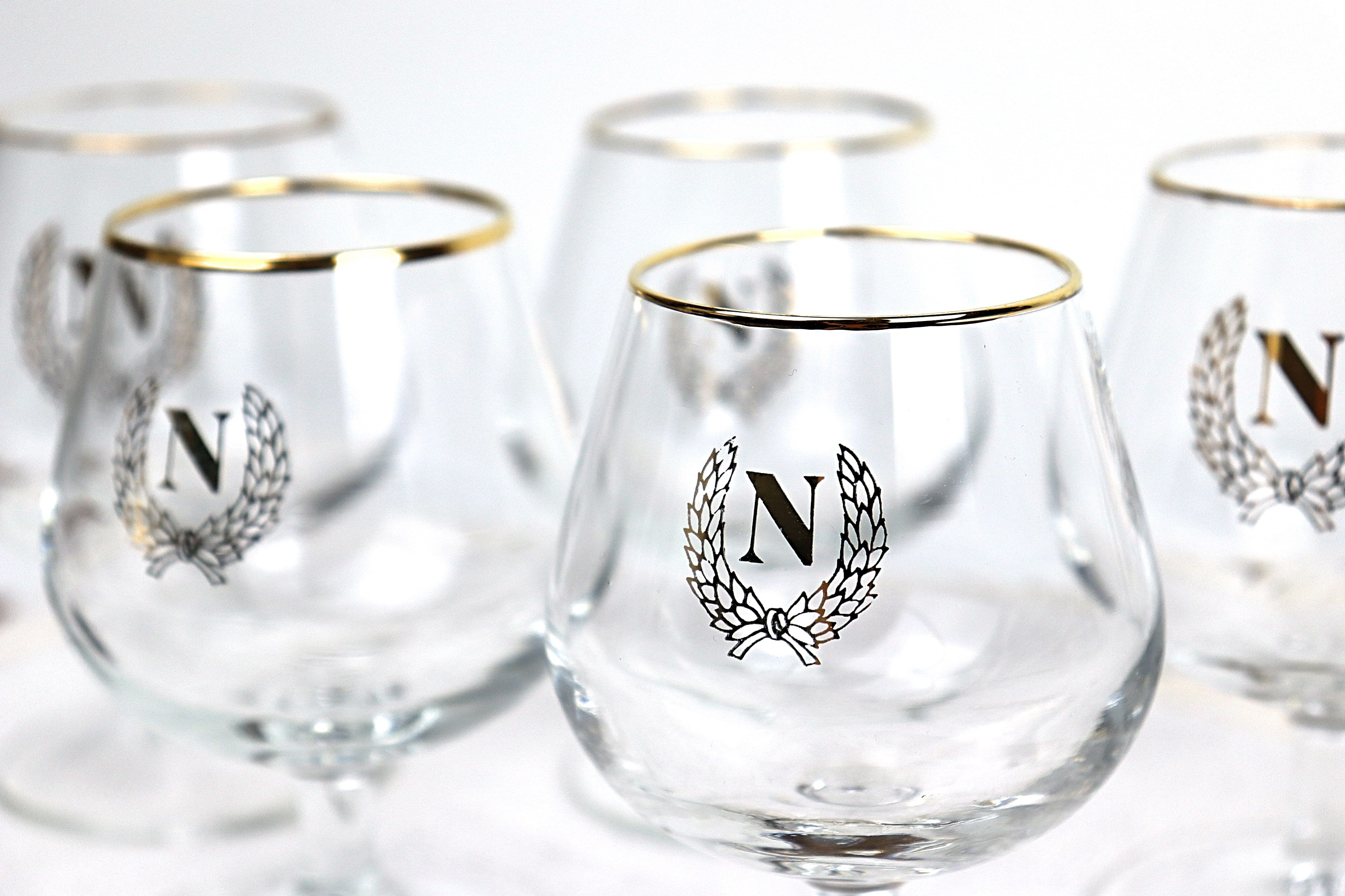 6 glasses with digestive "N"