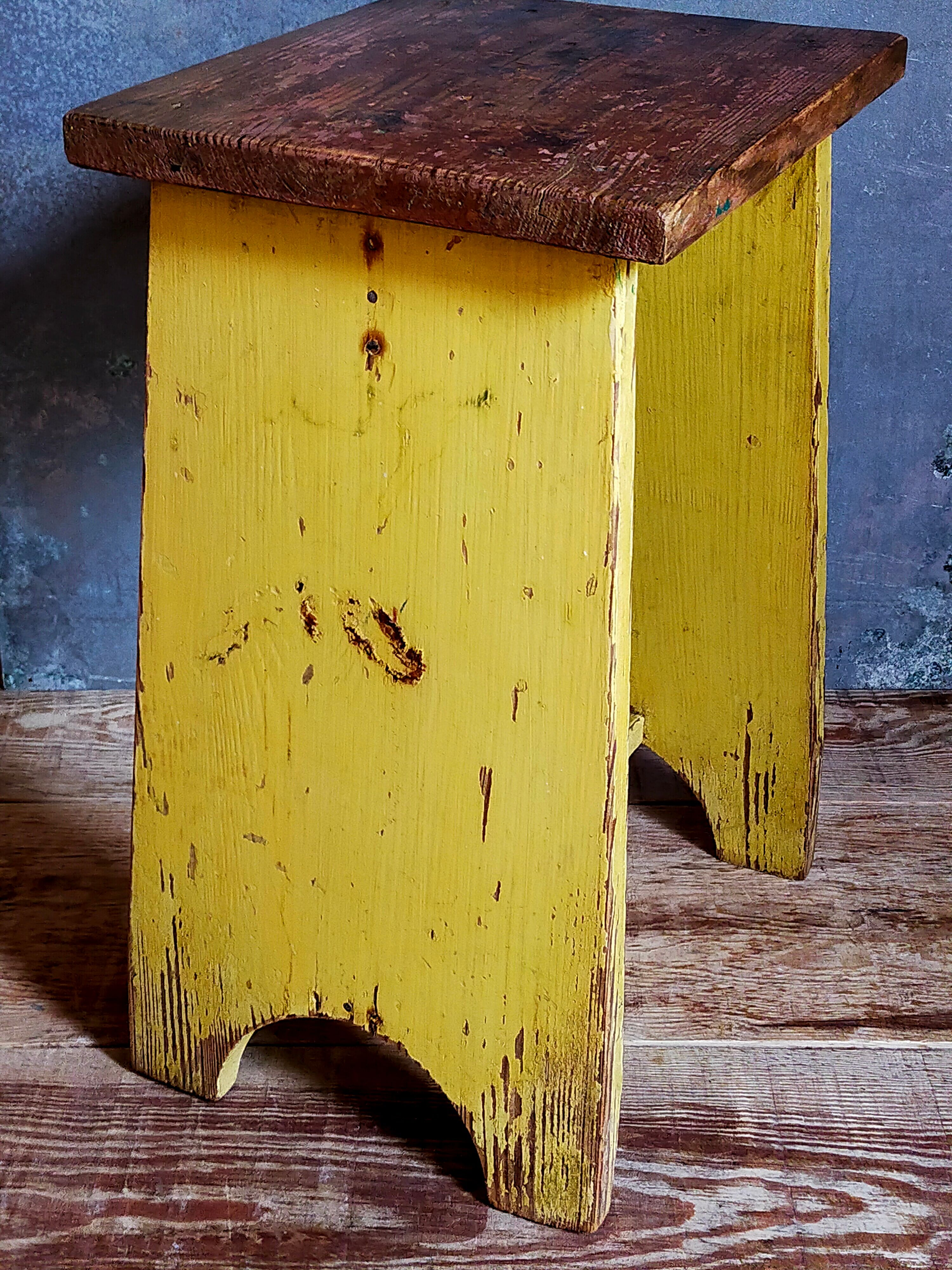 Art-populaire workshop stool in patinated wood
