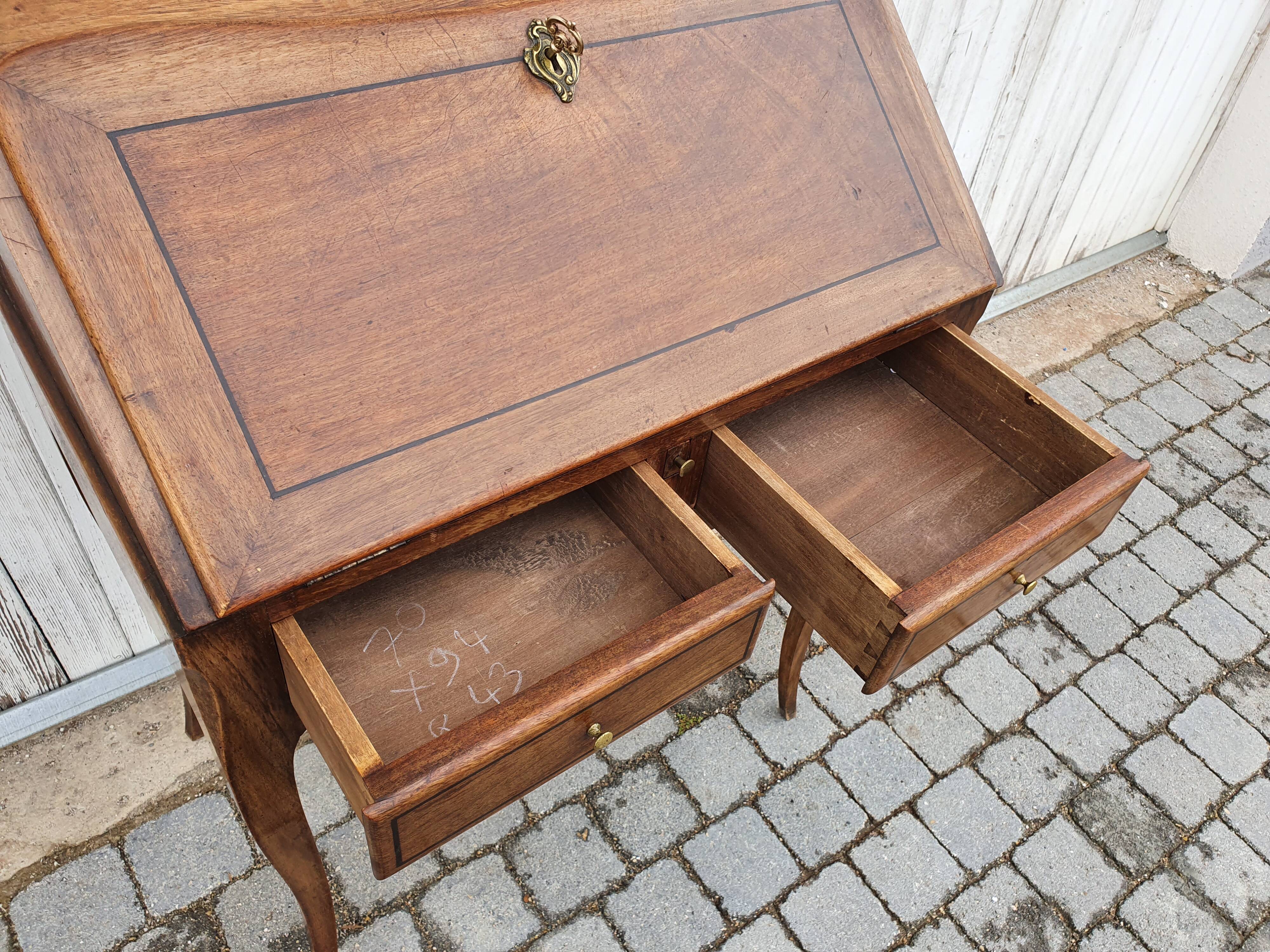 Former small secretary office with a walnut Louis XV