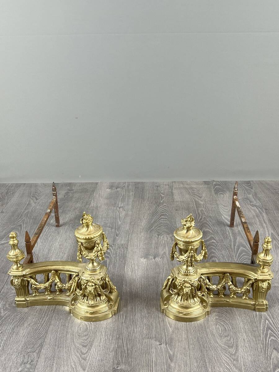 Pair of gilded bronze andirons, Louis XVI style, 20th century