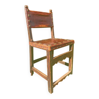 Retro medieval style leather and wood chair