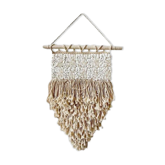 Boho wall decoration in macramé and large shells