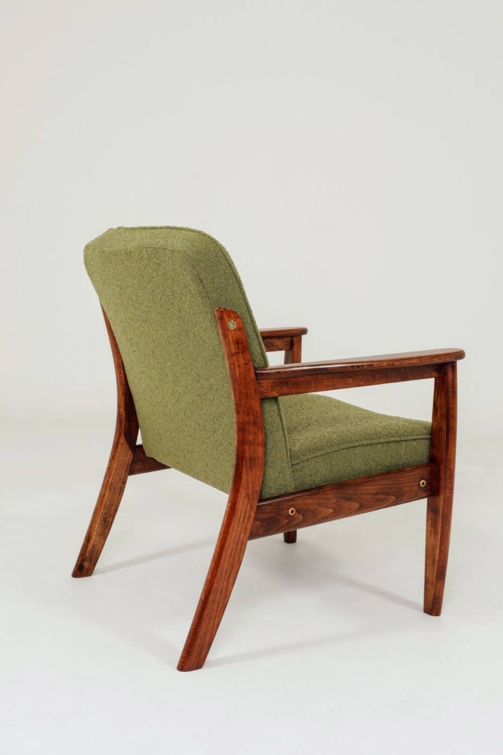 Fauteuil rétro en tissu boucle vert, forme ergonomique