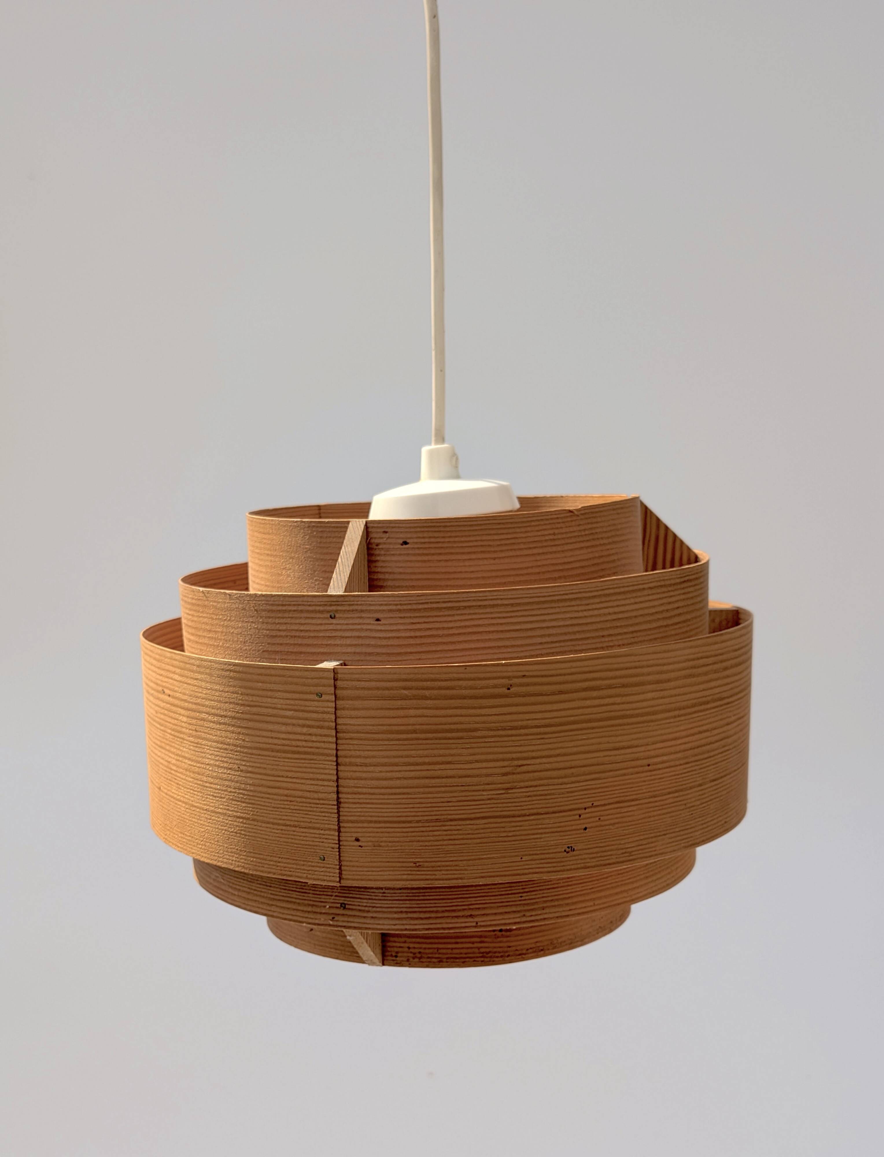 Suspension in pine veneer by Hans-Agne Jakobsson