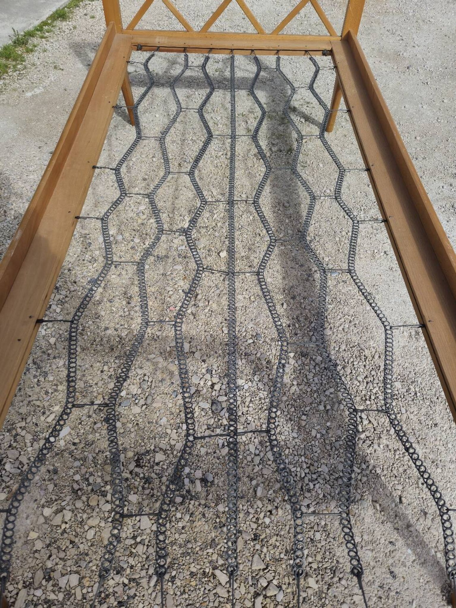 Vintage bed with compass feet from the 1950s