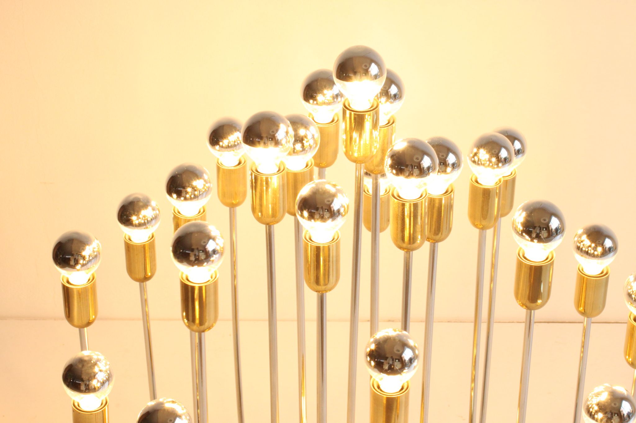 Tubular chrome and brass waterfall chandelier, Italy 1970s.