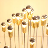 Tubular chrome and brass waterfall chandelier, Italy 1970s.