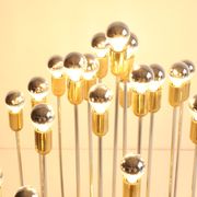 Tubular chrome and brass waterfall chandelier, Italy 1970s.