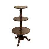 Three-tiered mahogany guéridon from the 19th century.