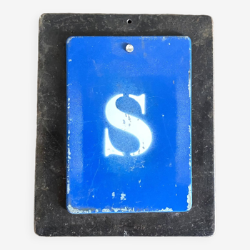 Letter S on metal plates