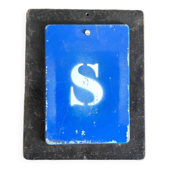 Letter S on metal plates