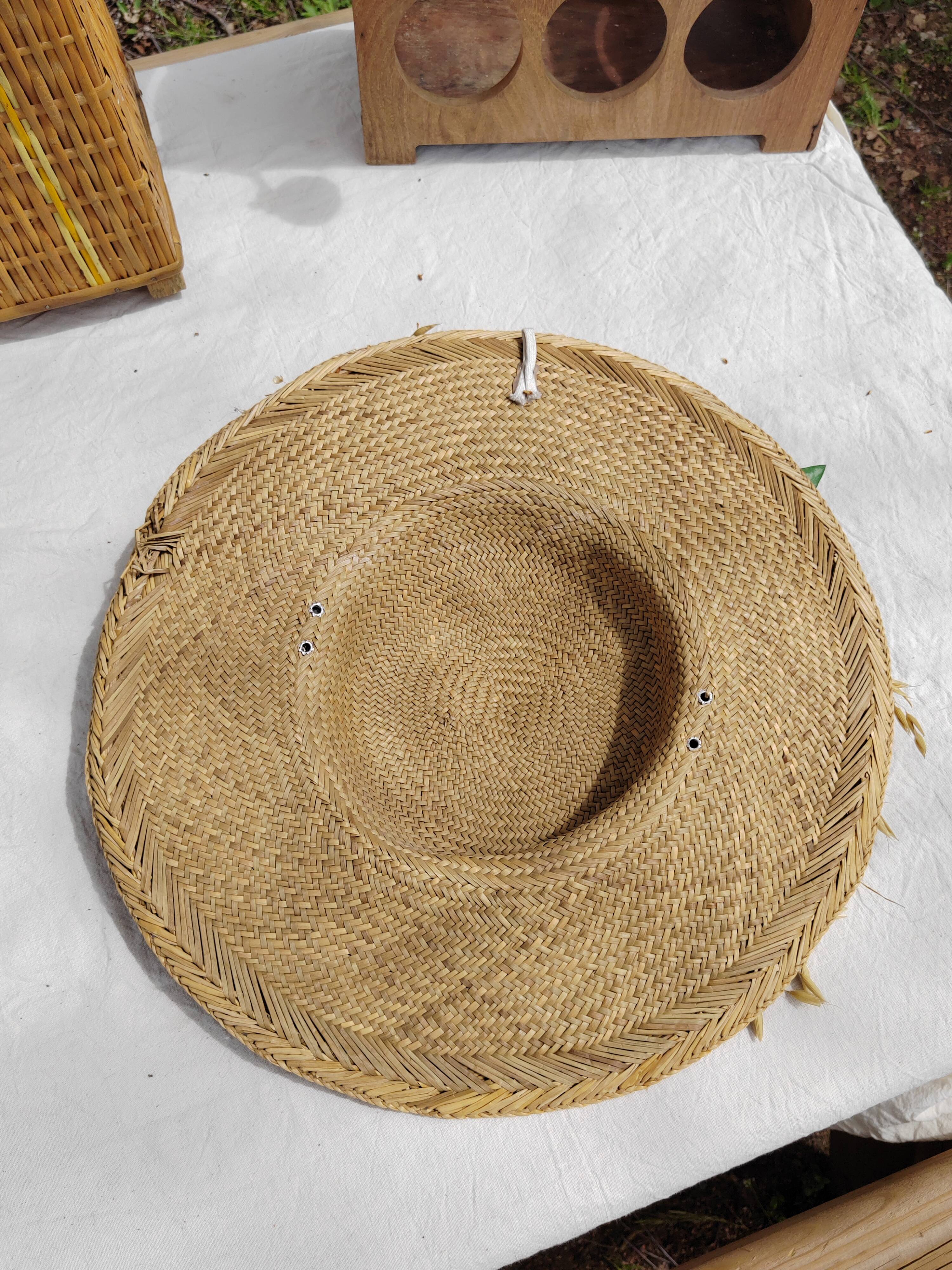 Decorative straw hat with dried flowers