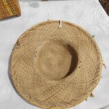 Decorative straw hat with dried flowers