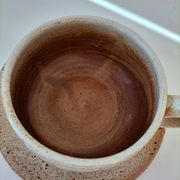 Large stoneware cup and saucer with floral decoration – 1970s