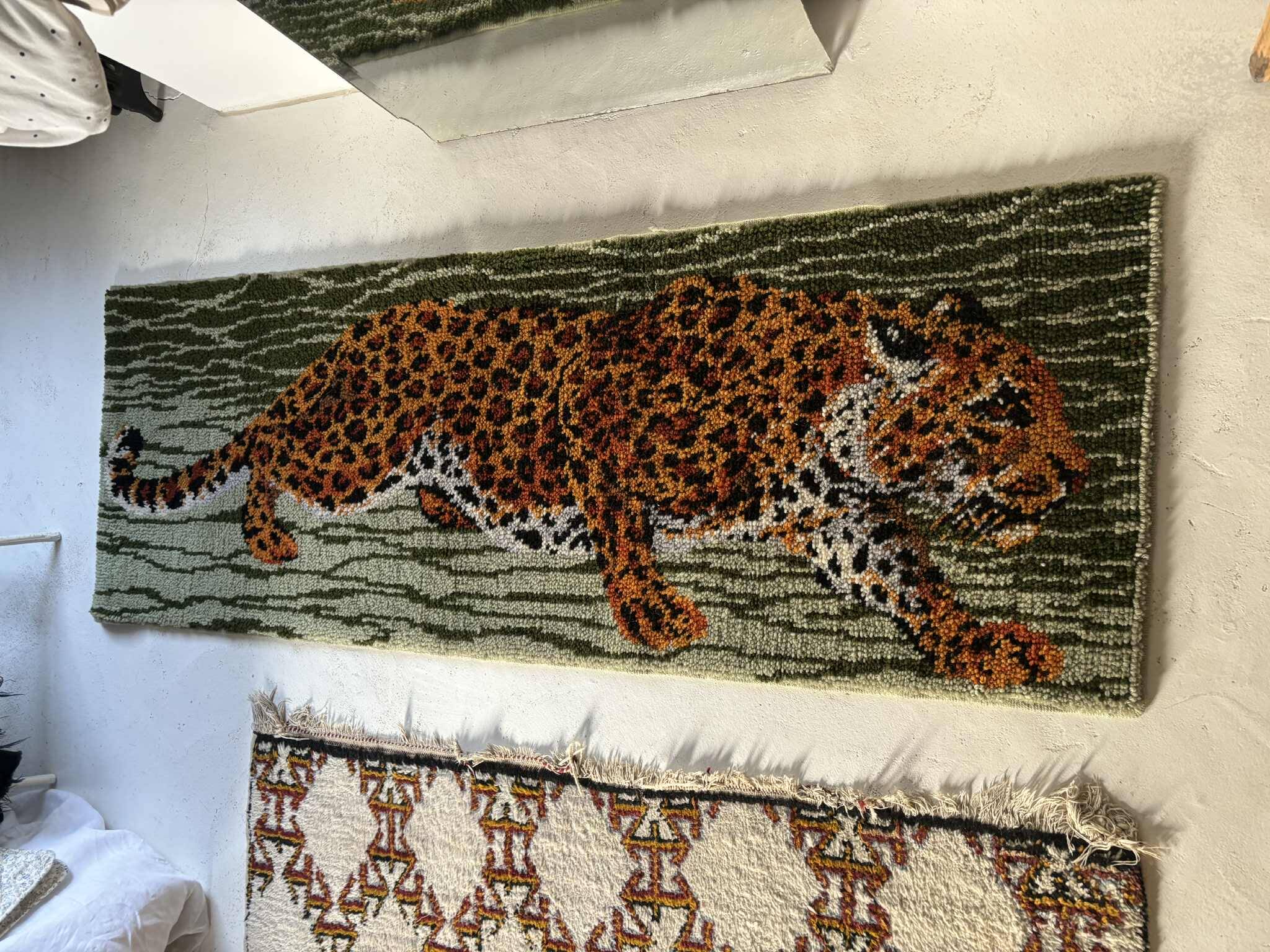 Vintage wool rug featuring a leopard (tiger)