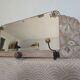 Art Deco wall coat rack with 3 hooks and a mirror.