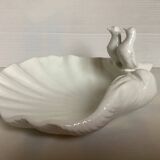 Scallop shell dove emptier