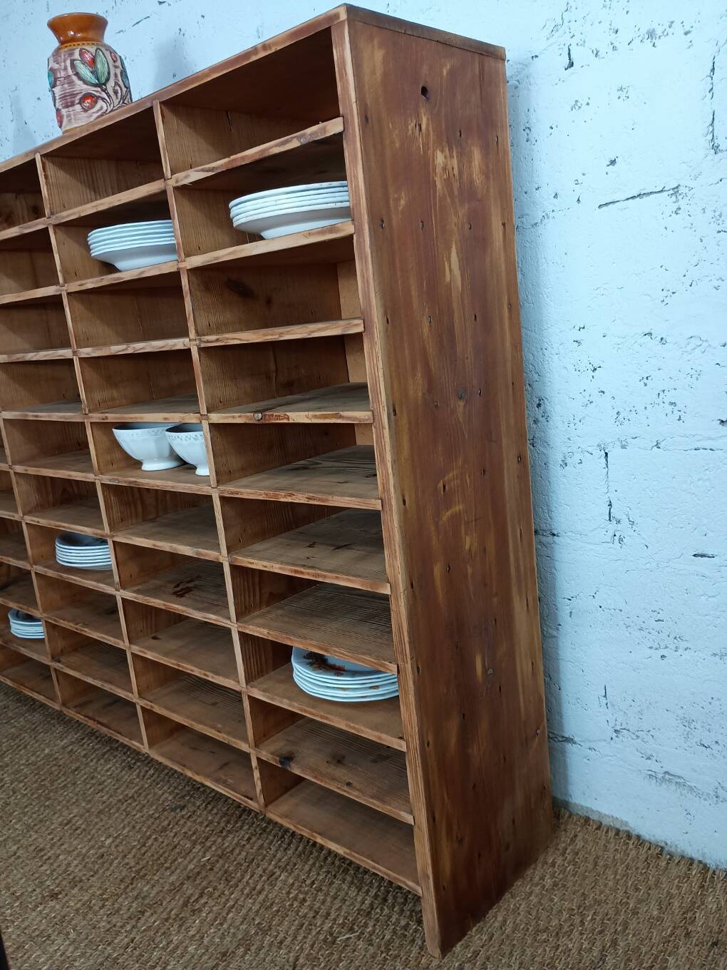 Wooden sorting cabinet with 50 compartments.