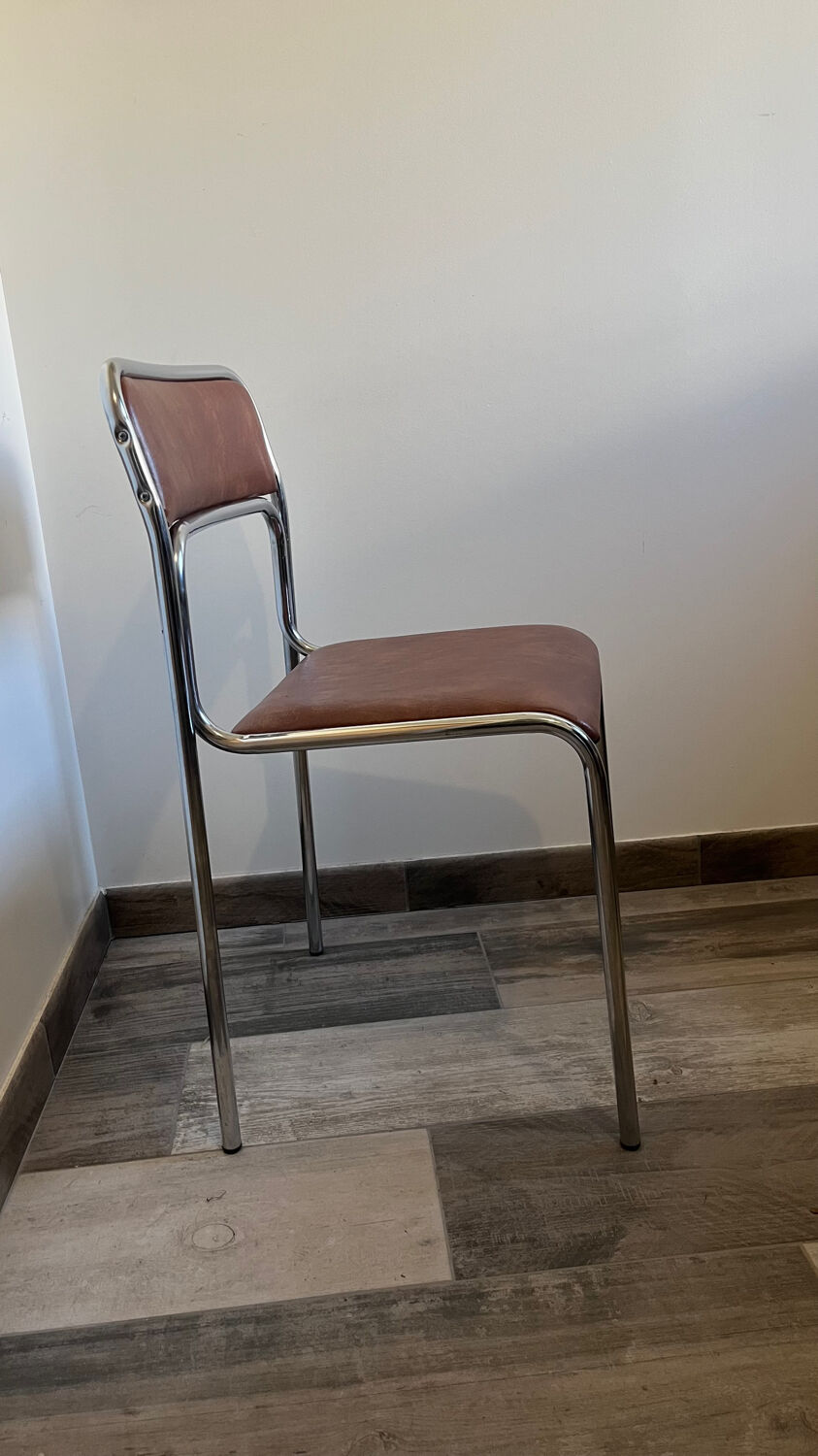 4 chrome chairs in faux leather