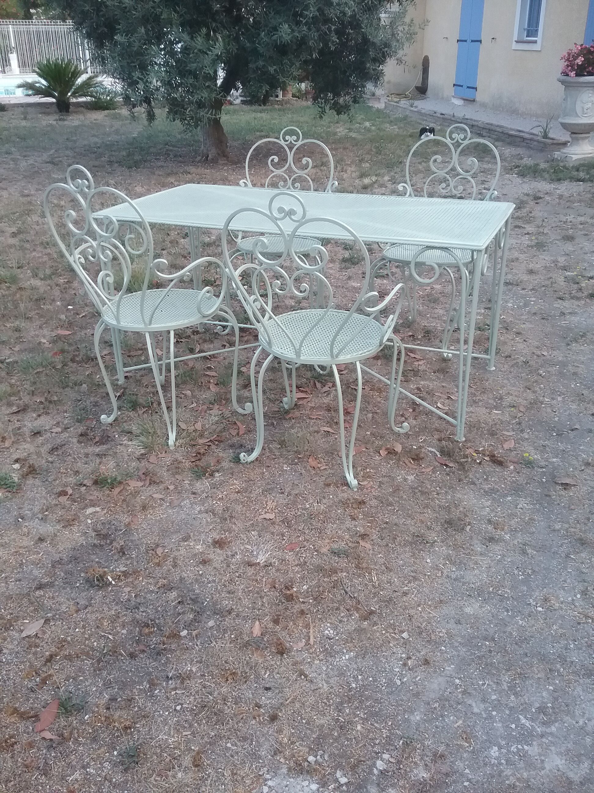 Garden furniture in green wrought iron