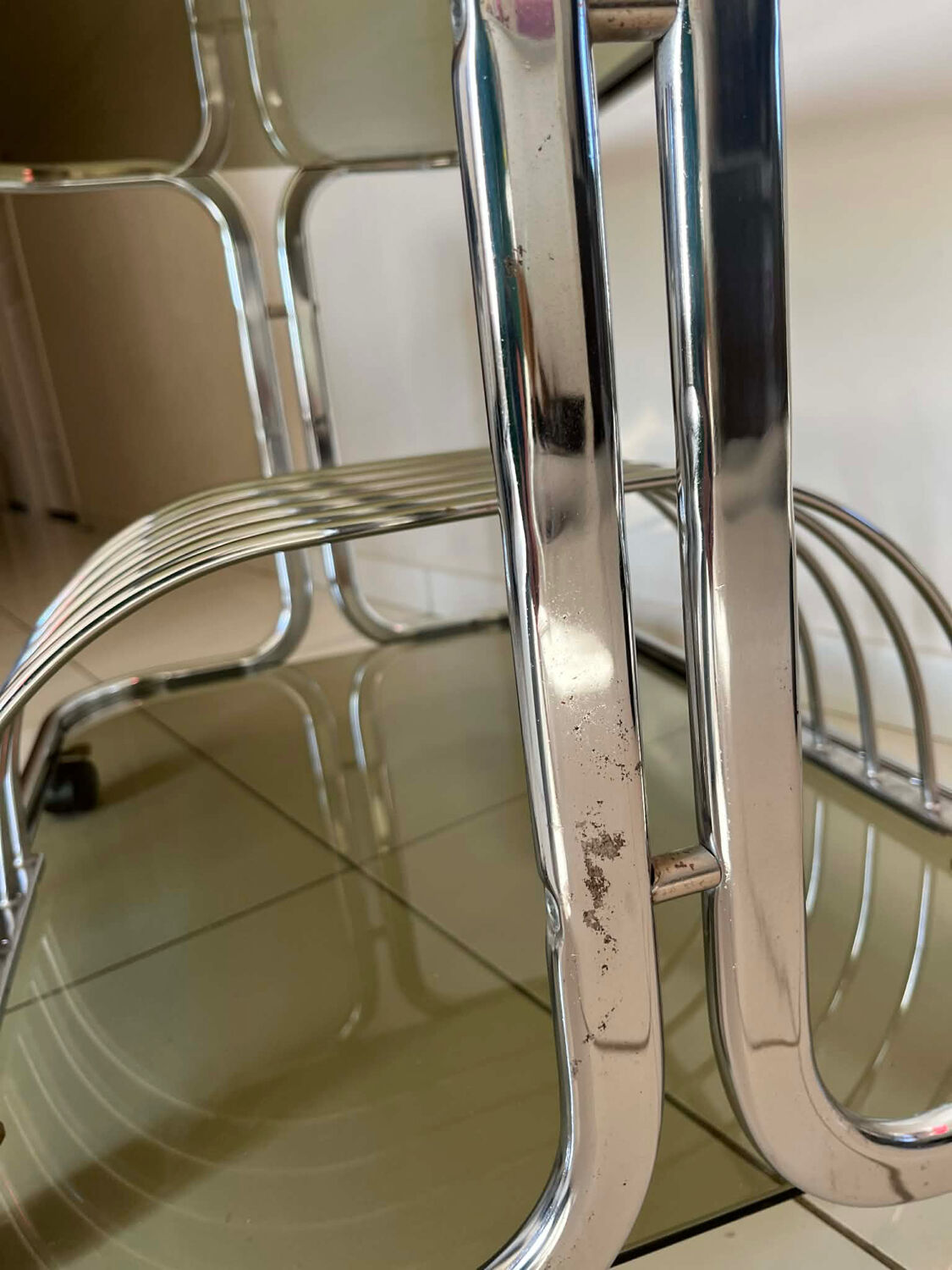1970s chrome and smoked glass side table with magazine and vinyl rack.