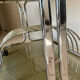 1970s chrome and smoked glass side table with magazine and vinyl rack.