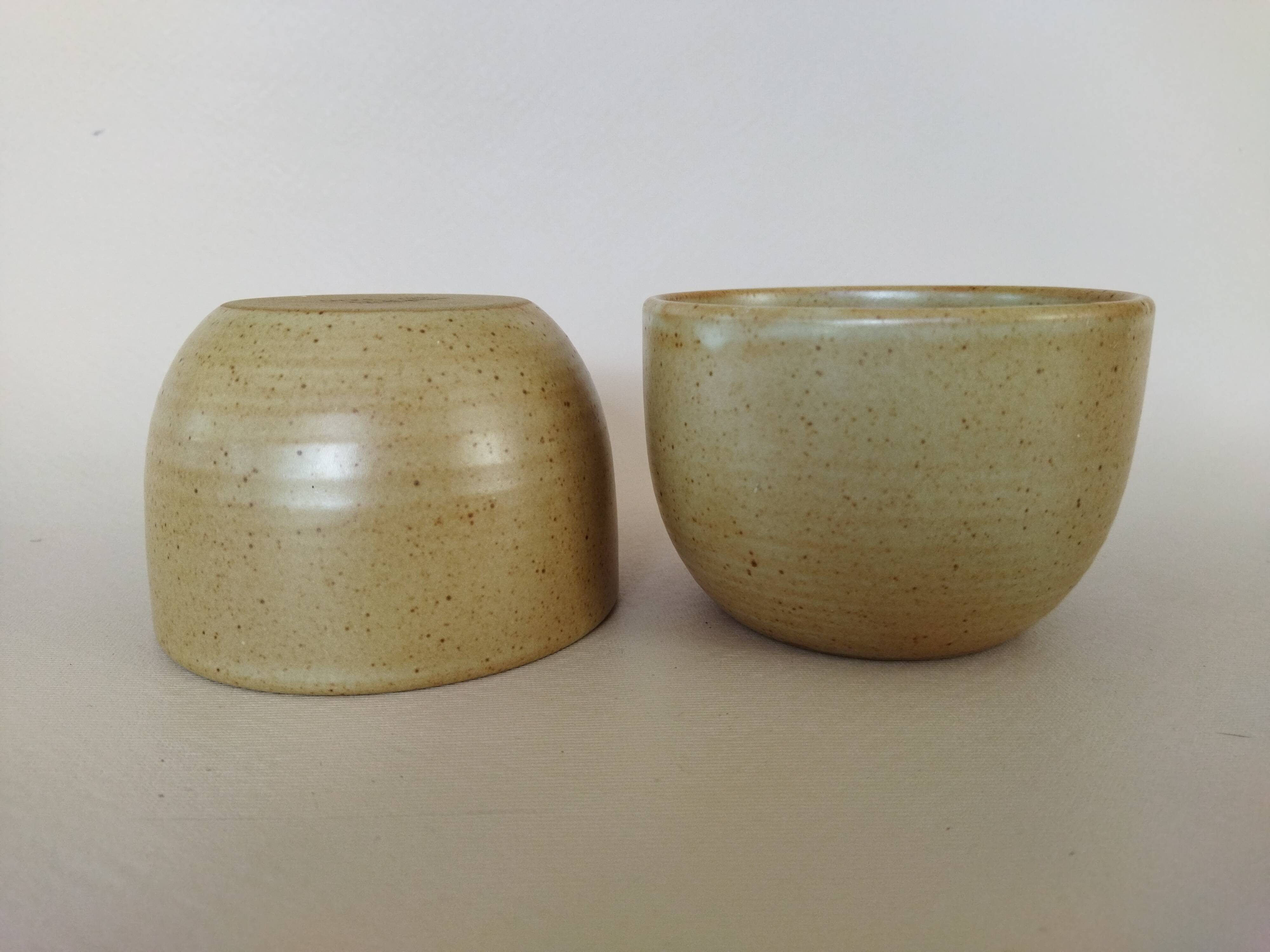 Covered tea bowls in CNP Village sandstone