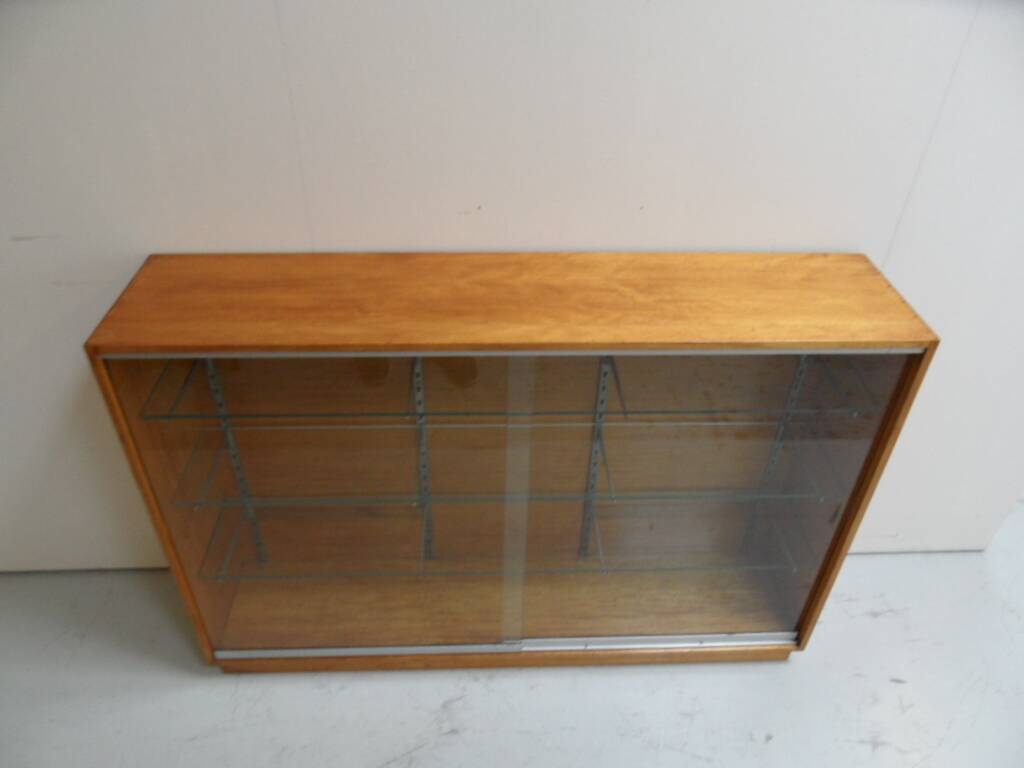 Vintage shop display cabinet with sliding doors