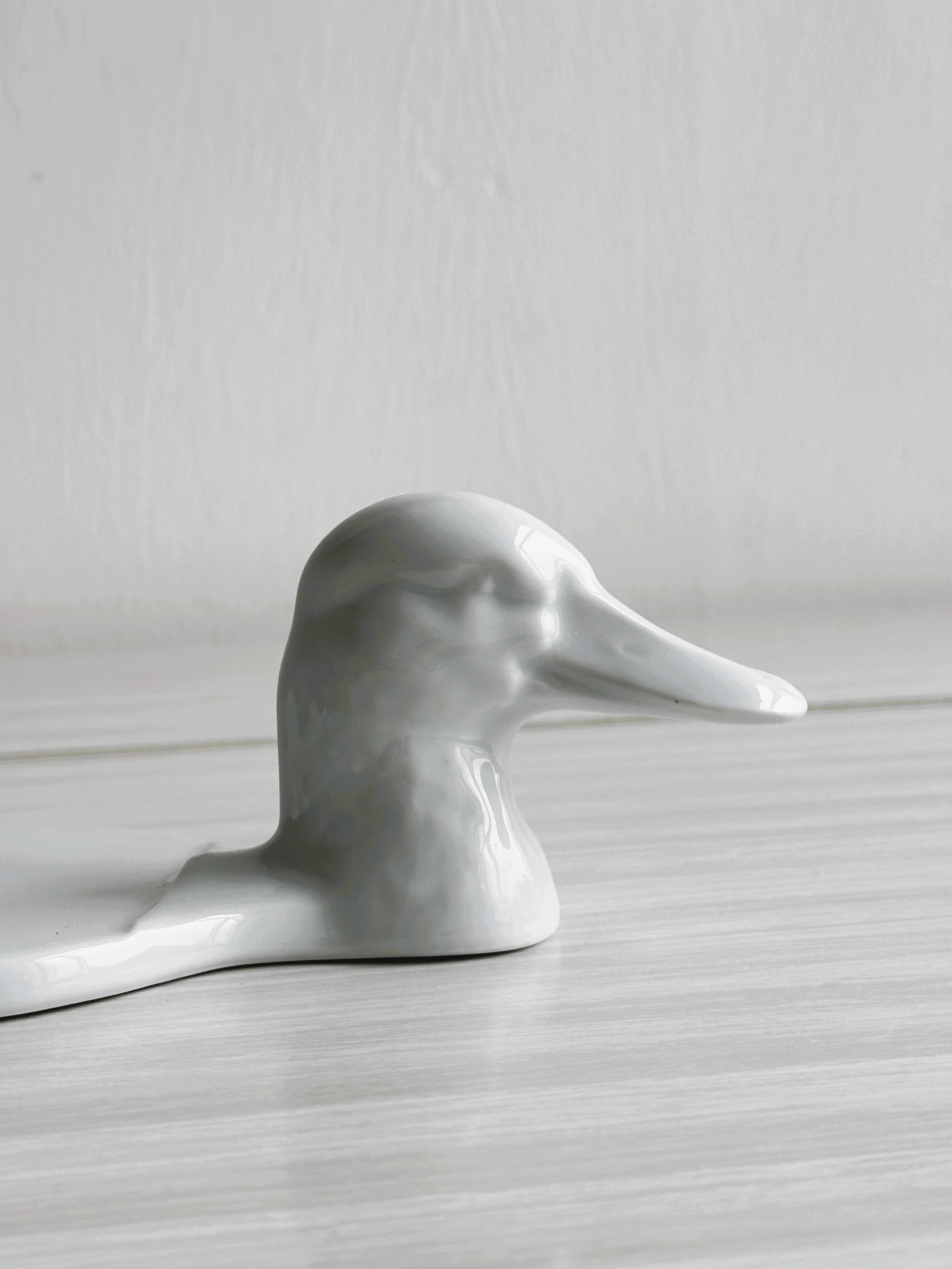 White porcelain dish in the shape of a duck.