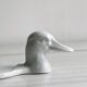 White porcelain dish in the shape of a duck.