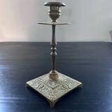 Chiseled brass candle holder