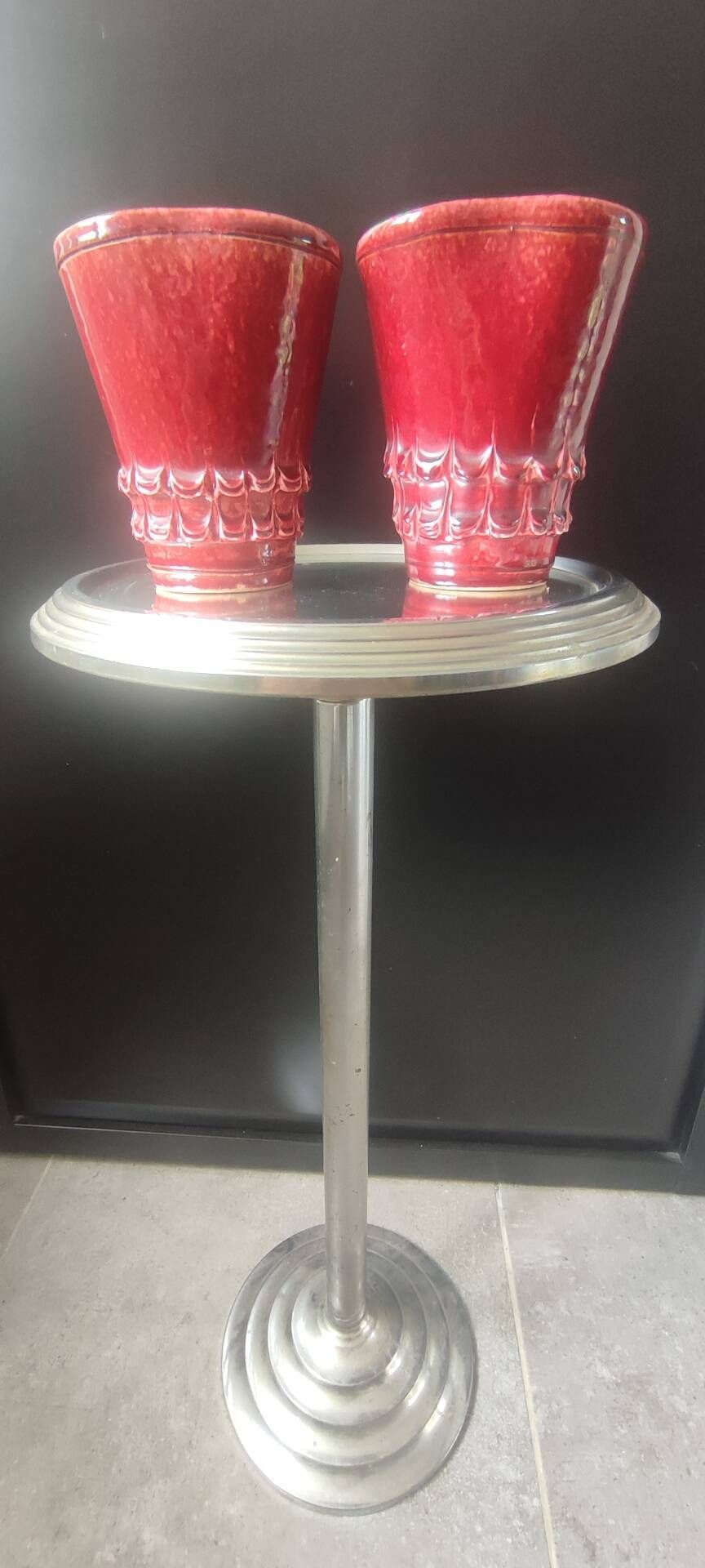 Pair of Art Deco asymmetrical red oxblood ceramic vases