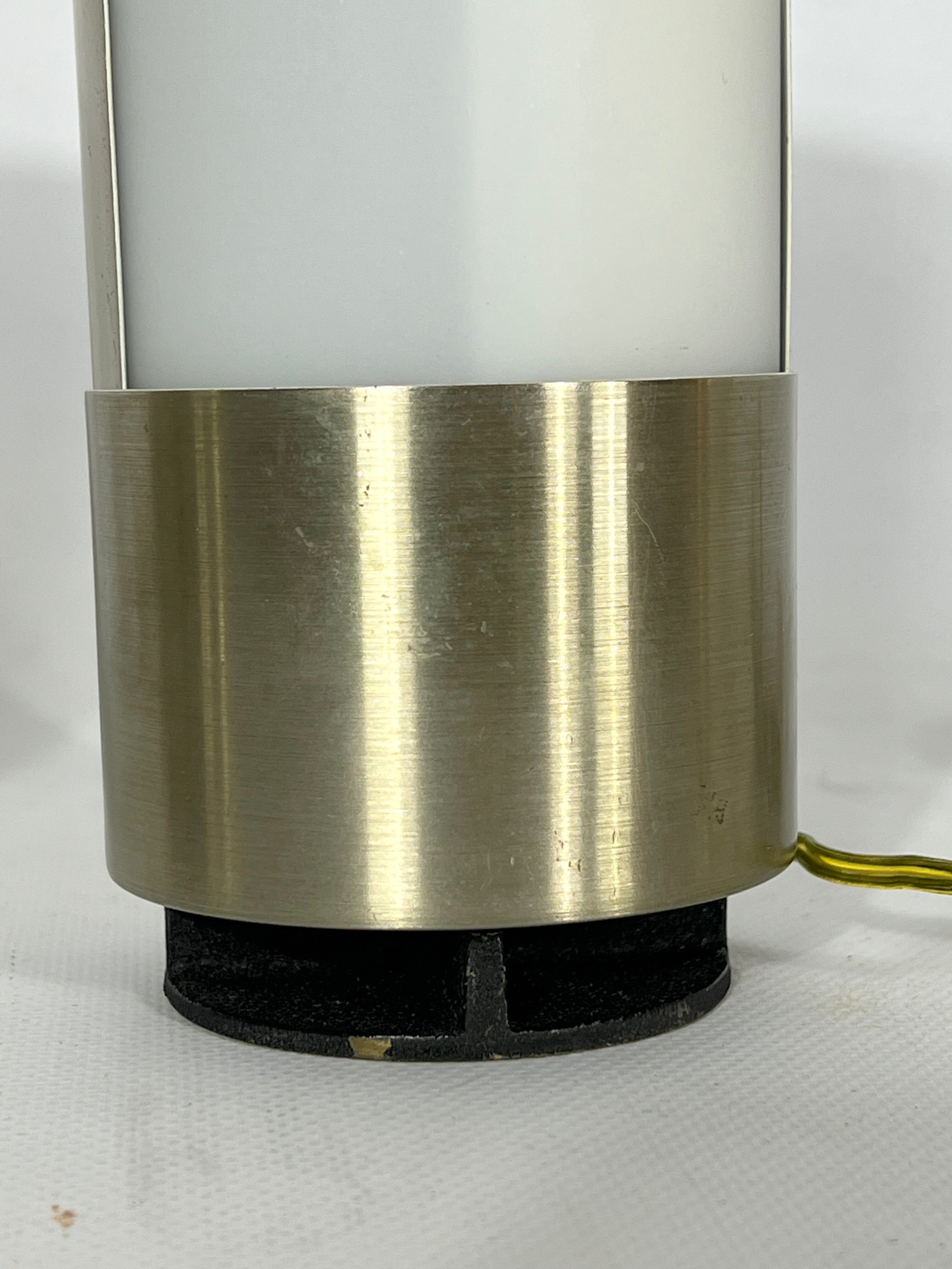 Mid-century modern pair of rare labeled Lumi Milano table lamps