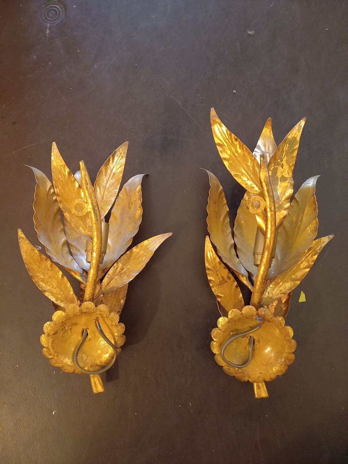 Pair of gold leaf sconces