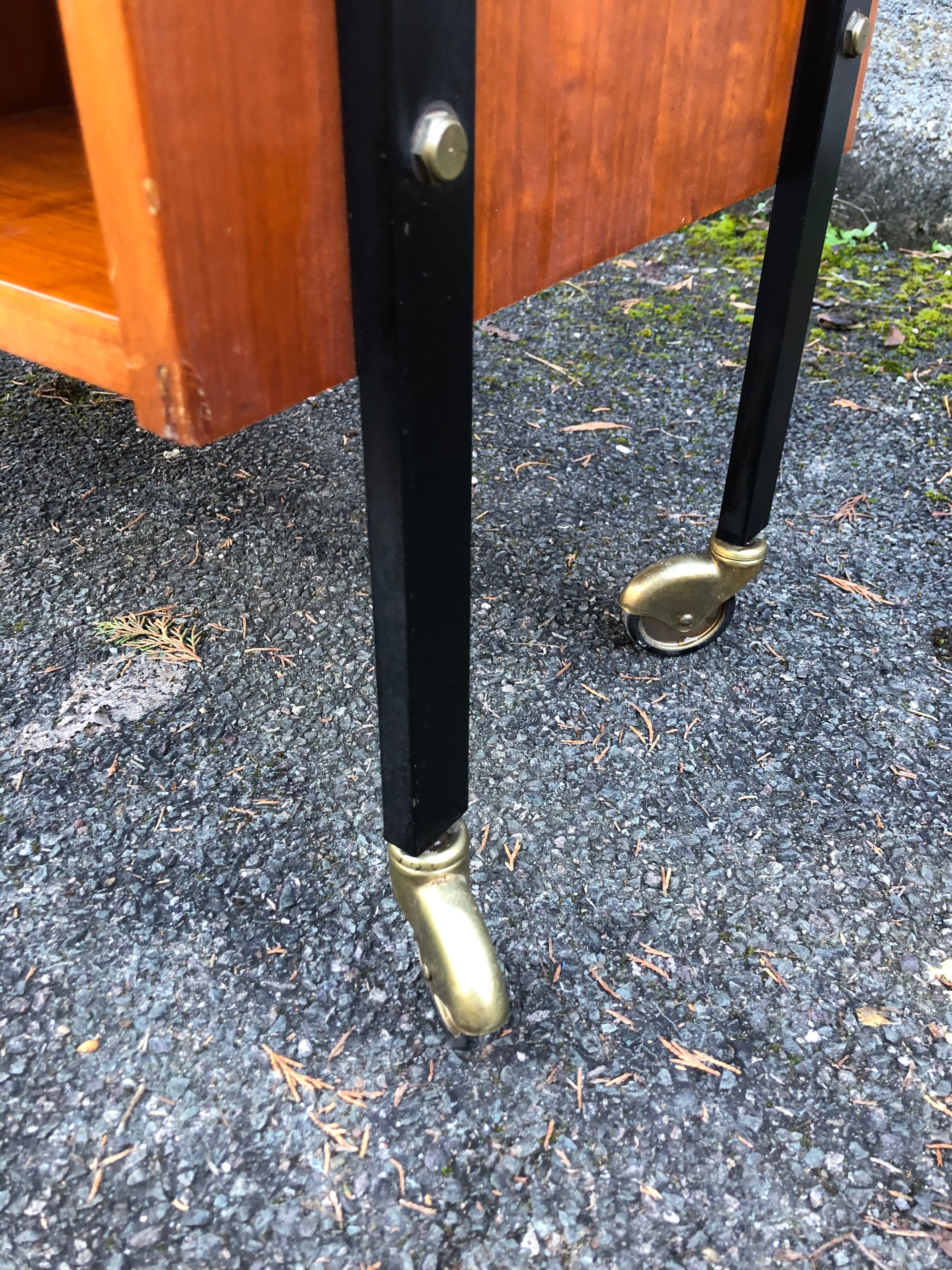1960 wheeled furniture wood and black metal