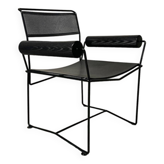 Fauteuil 1980 en métal perforé
