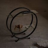 Decorative shelf unit, round metal frames with curved legs and glass shelves, 1960.