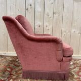Fauteuil style crapaud en velours rose capitonné