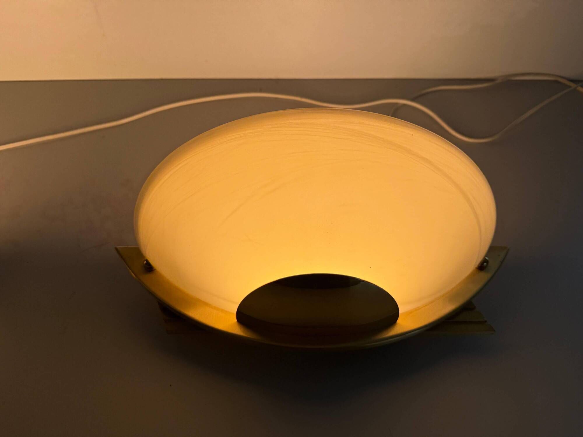 Pair of brass and glass wall lights from the Spage era, 1980, Germany.