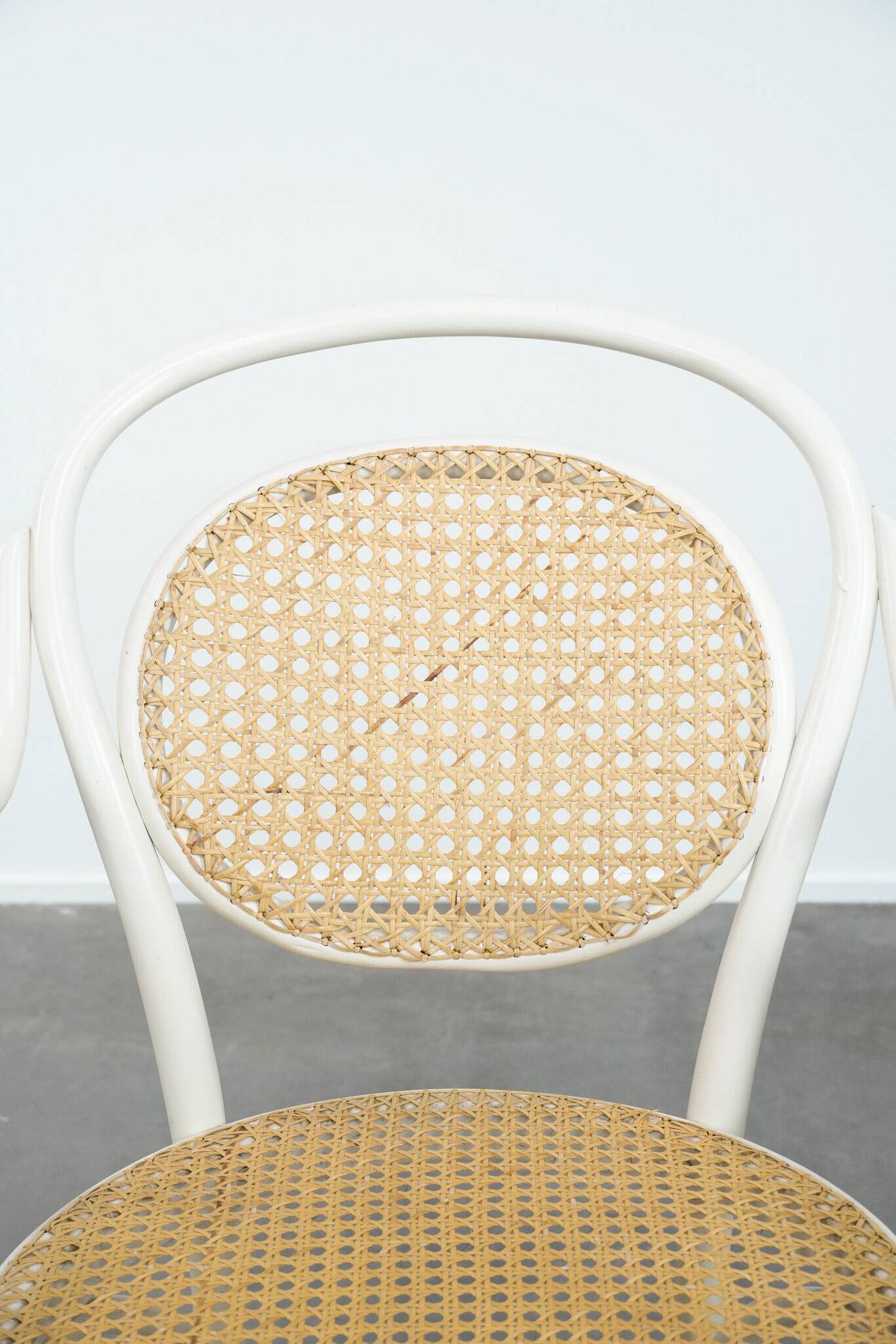 Vintage white bistro chair with armrests in Thonet style