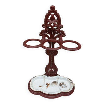 Patinated cast metal umbrella holder