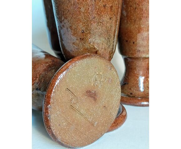 Five ancient potter's mazagrans in enamelled sandstone